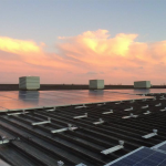 Solar panels on ECOE's Great Moor House installation at Sunset