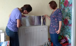 Our chair Tara installs energy saving measures