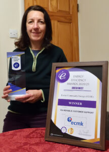 Healthy Homes Project Manager Tara Bowers with ECOE's Energy Efficiency Award 