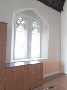 The last round of ECOE's community fund helped install secondary glazing to cut energy bills in community buildings. Credit: Whipton Community Hall. 
